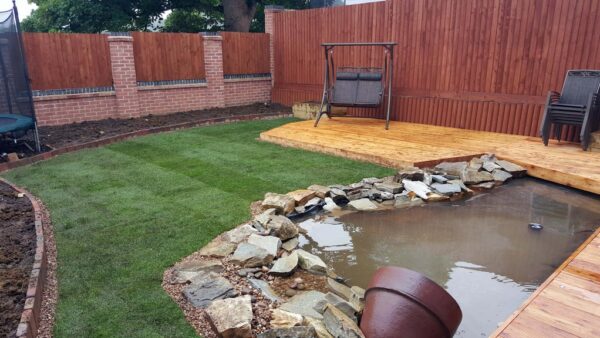 Garden pond with new lawn and timber decking — Mapperly, Nottingham, JDM Ponds
