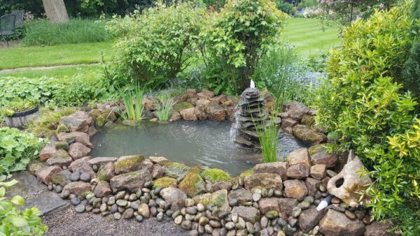 Natural rock garden pond with stone water feature — Nottinghamshire, JDM Ponds