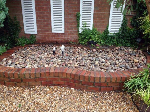 Raised pond converted to dry pebble feature — Ravenshead, Nottinghamshire, JDM Ponds